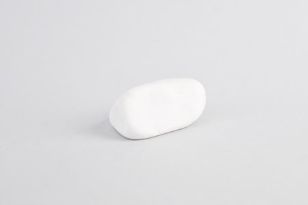 White pebble stone on gray background