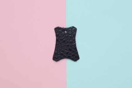 Sampler skin tag on blue pink backgroundの写真素材