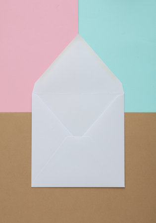 Ope White blank envelope on brown background