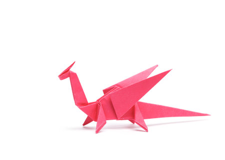 Paper origami dragon isolated on white backgroundの写真素材
