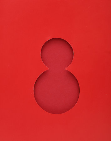 World Women's Day. Hole of red paper in the shape of the number 8の写真素材