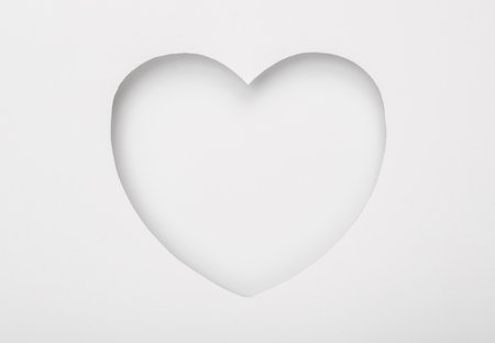 Cut paper in the shape of a heartの写真素材