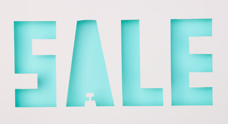 Cut paper in the shape of word saleの写真素材