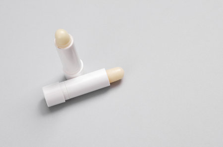 Hygienic lip balm on a gray backgroundの写真素材