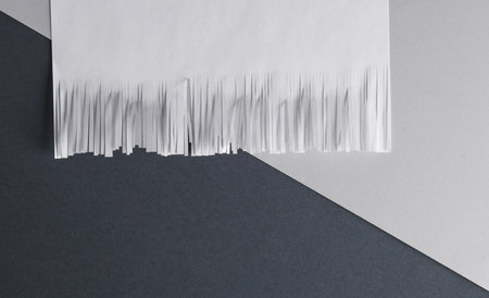 White cut shredded paper on gray background