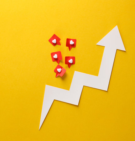 Growth arrow with social media likes on gray background. creative minimal layout. Statisticsの写真素材