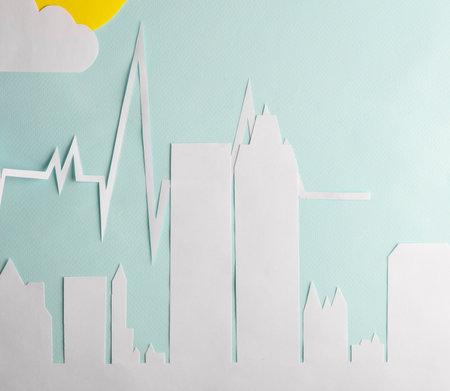 Paper cut modern cityscape with Cardiogram heart rhythm at daytimeの写真素材