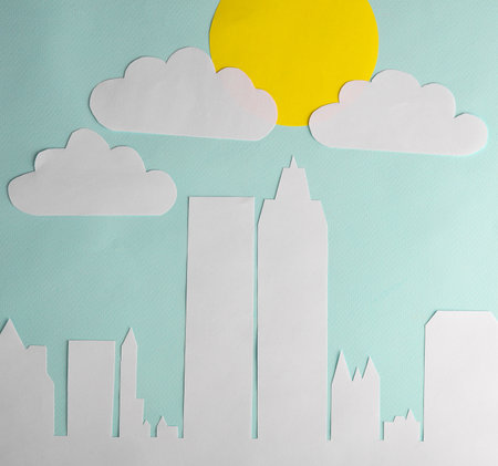 Paper cut modern cityscape with skyscrapers at daytimeの写真素材