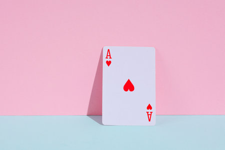 Ace of hearts on a blue-pink pastel background. Creative gambling layout