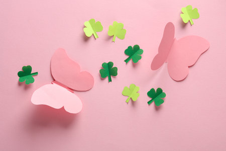 Hey spring! Paper-cut butterflies and clover leaves on a pink background. St.Patrick's Dayの写真素材