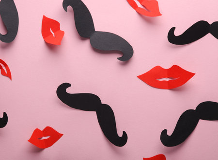 Paper mustache with red hearts on yellow background. Valentine's Day, love conceptの写真素材