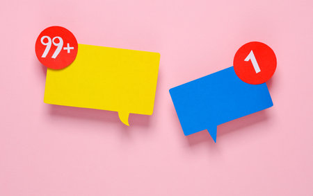 Paper cut Notification speech bubbles on pink background. Social media chat, message, sms, subscribe...