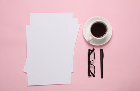 White blank sheets of a4 paper size or documents mockup with pen, eyeglasses and coffee cup on pink...