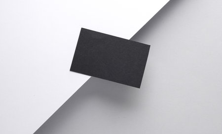 Black business card on white gray background. creative layoutの写真素材