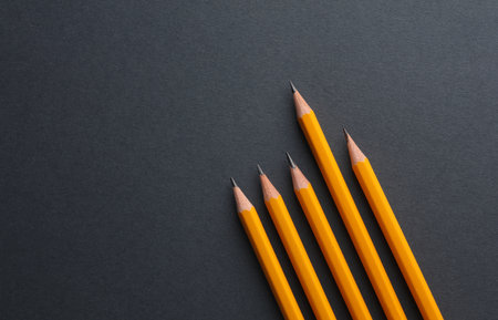 Yellow pencils on a dark background. Creativity setの写真素材
