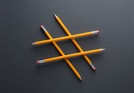 Hashtag from pencils on dark backgroundの写真素材