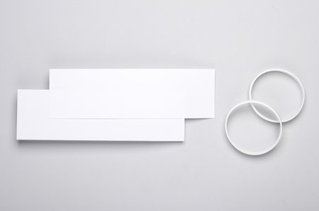 Concert ticket mockup with bracelets on a gray background. template for design. music festの写真素材