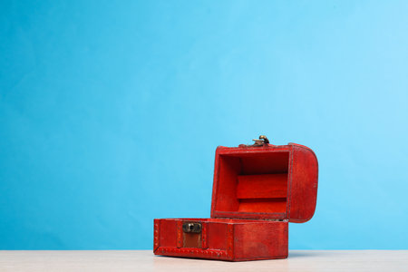 Red pirate chest on a blue background
