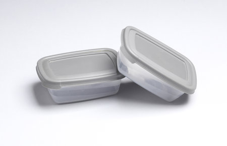 Plastic containers for storing food on a gray backgroundの写真素材