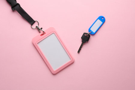 ID card and Plastic tag with key on gray backgroundの写真素材