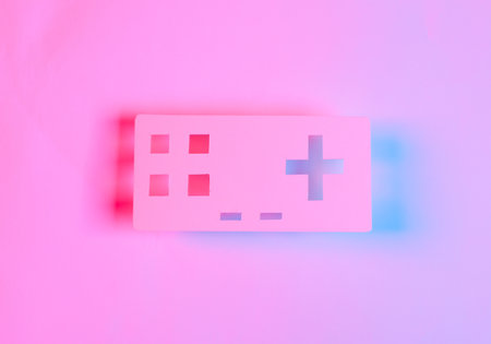 Paper cut gamepad in red blue neon light