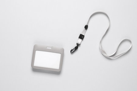 Id card badge with belt on gray backgroundの写真素材