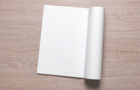 Blank magazine or notebook on the table. Template for design, layout.の写真素材