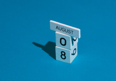 White cube calendar with the date august 08 on a blue background. Deadline, business concept