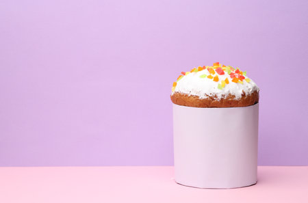 Easter cake with white label on pastel background. Creative mockupの写真素材