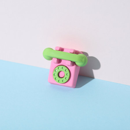 Rotary phone miniature on pastel background. Creative layoutの写真素材