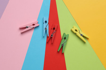 Lot of colorful clothespins on colored backgroundの写真素材