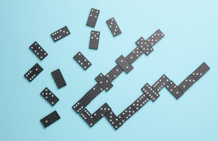 Many Dominoes on a blue background.