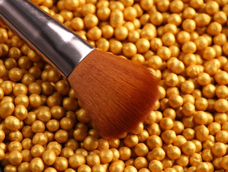 Makeup brush on Bronze make up powder balls. Beauty conceptの写真素材