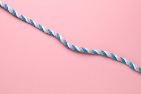 Colored rope on a pink background. minimalismの写真素材