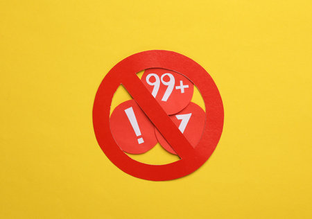 Social media ban. Prohibition sign with red round notification icons on yellow backgroundの写真素材