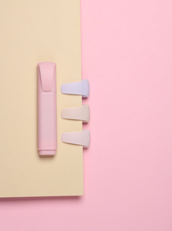 Markers or colored felt-tip pens on a pastel background. Top view. Creative layoutの写真素材