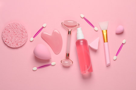 Beauty products on a pastel background. Pink color trend. Flat layの写真素材