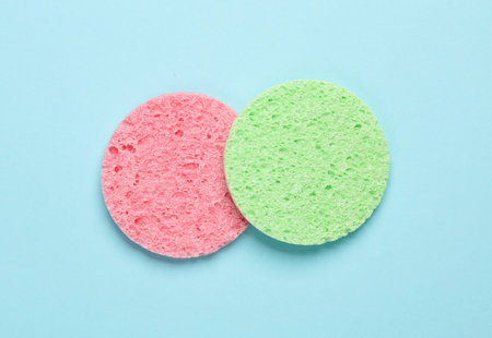 Make-up remover sponges on blue backgroundの写真素材