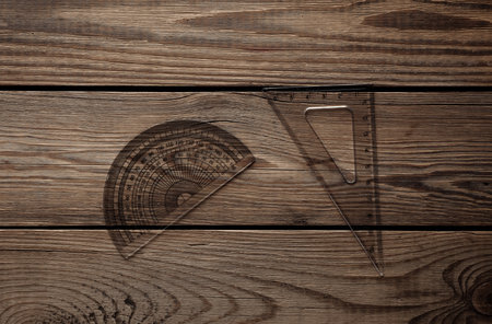 Set of rulers on wooden background. Back to school, geometry, exact sciences