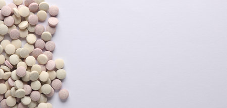 Vitamin pills for animals on white background with space for your textの写真素材