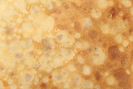 Texture of fried pancake close-up