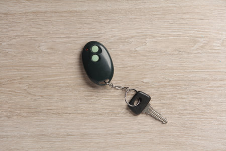 Remote Control Car Key on wooden table