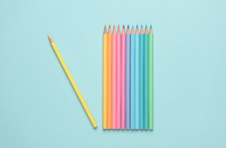 Set of colored pencils on a blue backgroundの写真素材