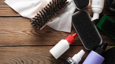 Shoe care products and accessories on a white background
