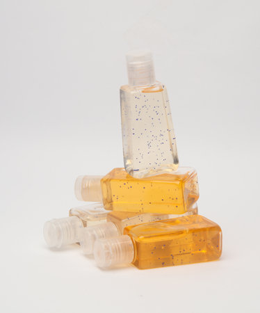 Antiseptic bottles isolated on white backgroundの写真素材