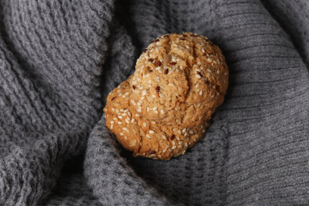 Cereal cookies on gray fabric blanketの写真素材