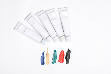 Set of White tubes of acrylic or oil paint for creativity on white background. Template for design, mockupの写真素材