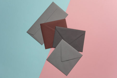 Various envelopes on a blue-pink background