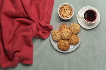 Breakfast in bed. Food on a dark blanket. Top viewの写真素材