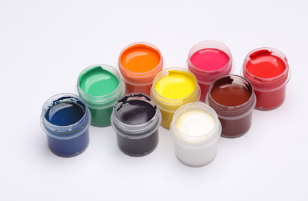 Set of gouache paints in bottles on a white background. Children's creativityの写真素材